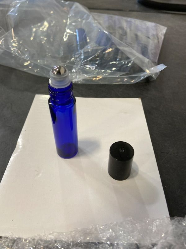 Photo 2 of 12 Cobalt Blue Glass Roll-On Bottles with Stainless Steel Roller Balls (10 ml) for Essential Oils, Colognes & Perfumes (12 pk)