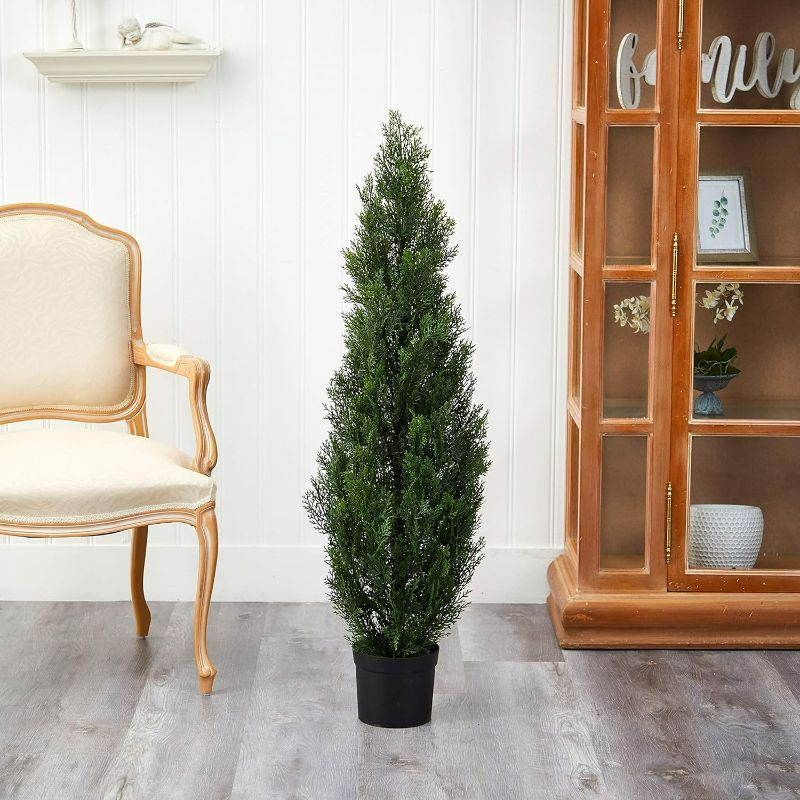 Photo 1 of Nearly Natural 4FT Faux Cedar Tree, Outdoor Front Porch Décor, Faux Cedar Tree Pine Tree in Nursery Planter with UV Resistant Coating

