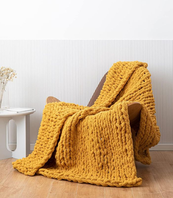 Photo 1 of Chunky Knit Blanket Soft Chenille Yarn Knitted Throw Blanket 50"X60" Handmade Cable Warm Thick Giant Blanket for Couch Bed Trips (Turmeric Yellow, Throw 50"X60")