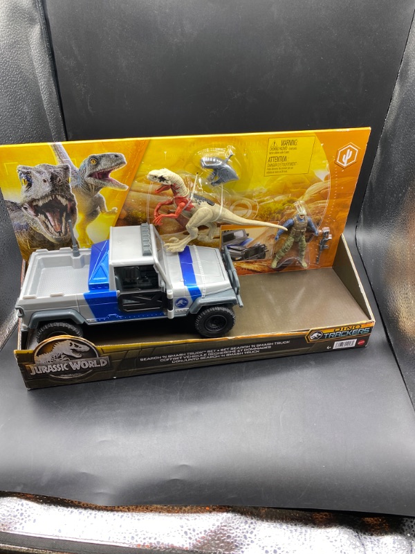 Photo 2 of Jurassic World Search N Smash Truck Set with Atrociraptor Dino & Human Action Figure Toys
