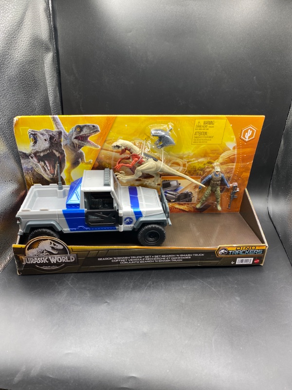 Photo 2 of Jurassic World Search N Smash Truck Set with Atrociraptor Dino & Human Action Figure Toys
