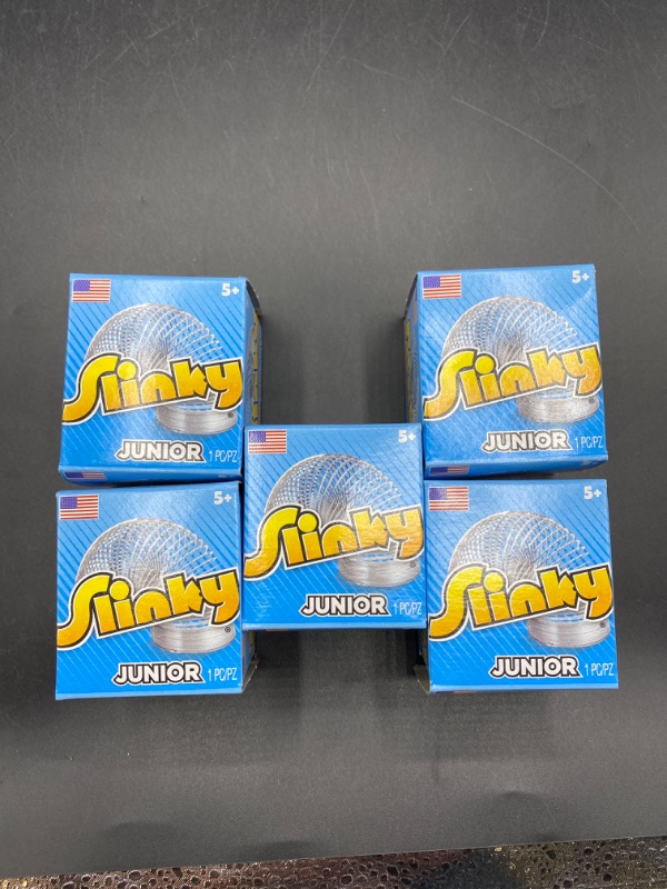 Photo 1 of Slinky Brand Jr. The Original Walking Spring Toy, 5-Pack Small Metal Slinkys, Great for Party Favors and Gift Bag Toys, Multi-Color (03160)
