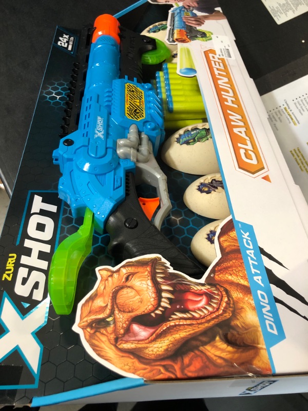 Photo 2 of Dino Attack Claw Hunter (24 Darts + 4 Shooting Targets) by ZURU, X-Shot Blue Foam Dart Blaster, Toy Blaster, Shotgun Style, Twin Barrel, Dinosaur Design Toys for Boys, Kids, Teens (Blue)
