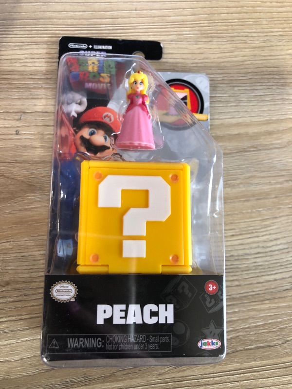Photo 3 of The Super Mario Bros. Movie 1.25 Inch Mini Princess Peach Figure with Question Block
