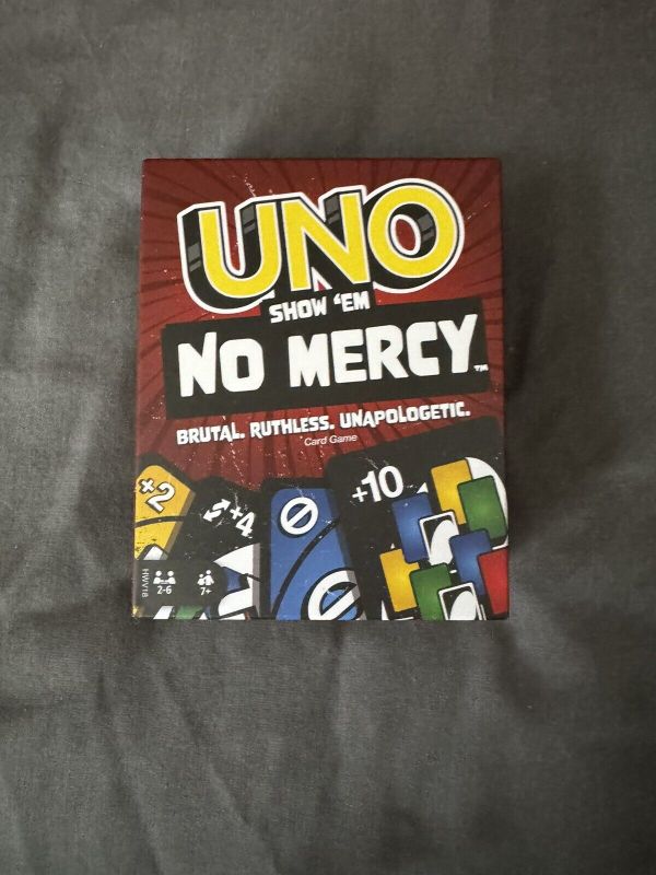 Photo 2 of UNO Show ‘em No Mercy Card Game for Kids Adults & Family Night Parties and Travel
