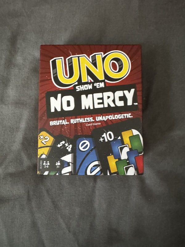 Photo 1 of UNO Show ‘em No Mercy Card Game for Kids Adults & Family Night Parties and Travel
