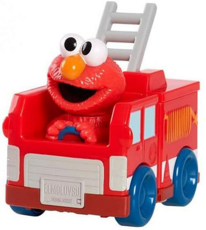 Photo 1 of Sesame Street Twist & Pop Wheelies Elmo Vehicle
