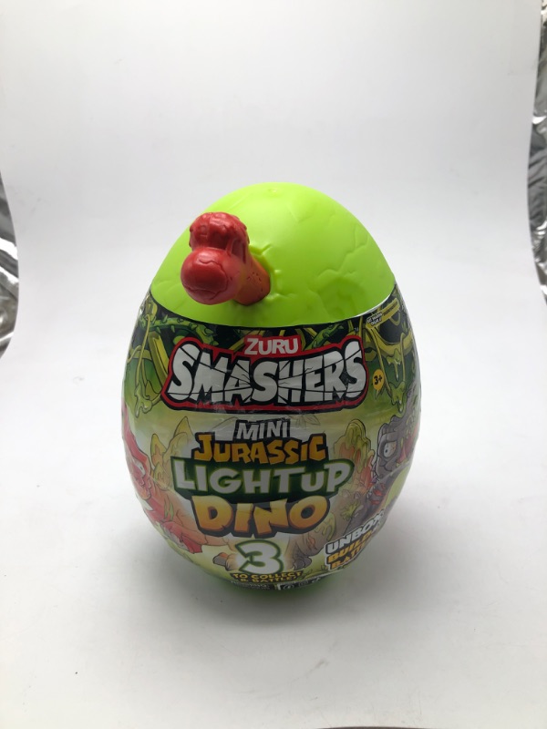 Photo 2 of Smashers Mini Jurassic Light up Dino Egg Novelty & Gag Toy by ZURU for Ages 3-99
