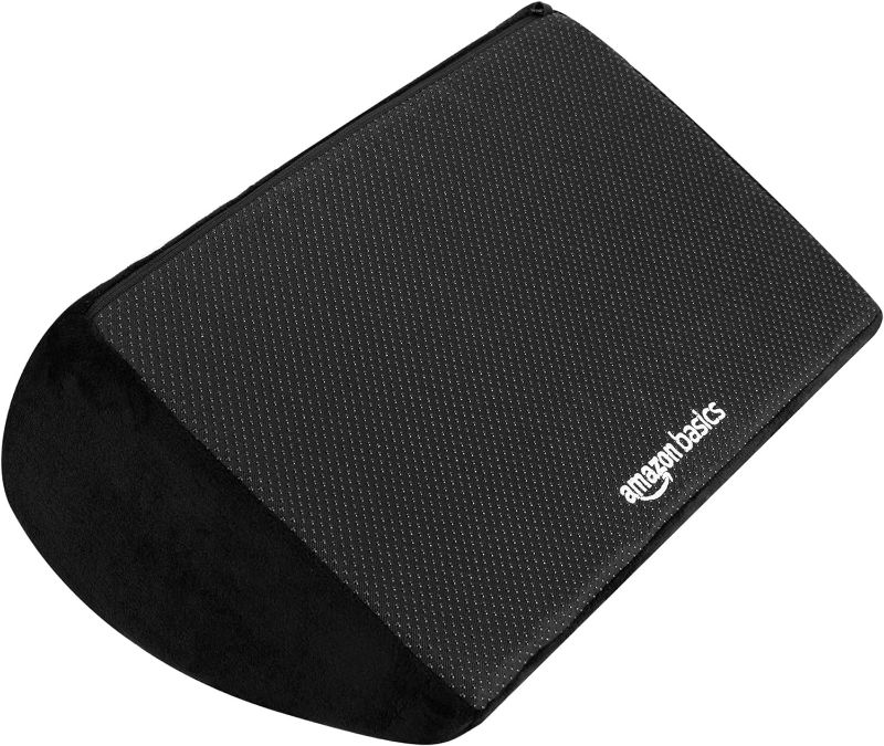 Photo 1 of Amazon Basics Under Desk Foam Foot Rest with Washable Cover Comfortable Foot Stool for Home and Office, Black, 5.1 x 10.2 x 17.3 Inch
