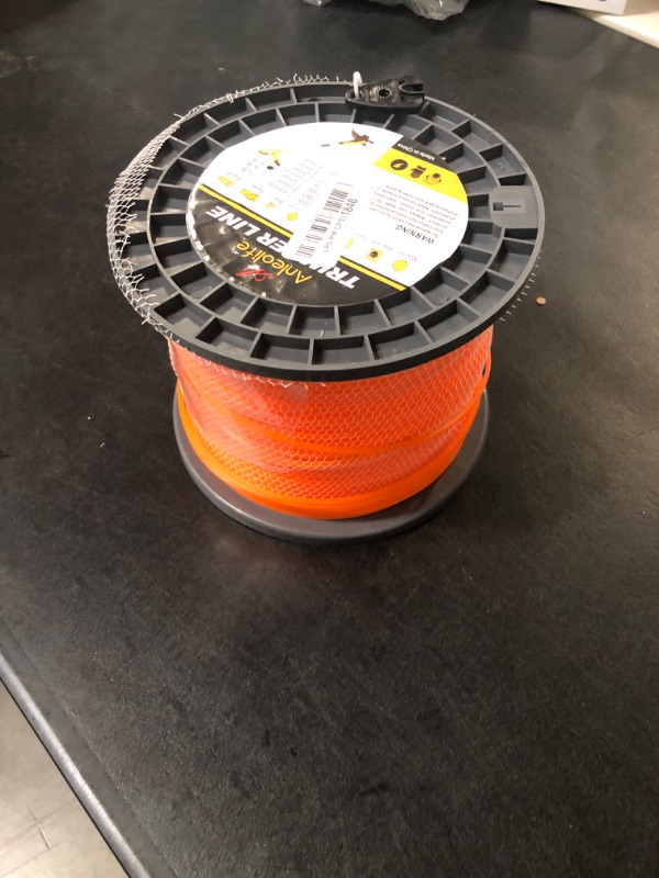 Photo 2 of A ANLEOLIFE 5-Pound Commercial Square .095-Inch-by-1280-ft String Trimmer Line in Spool,with Bonus Line Cutter, Orange