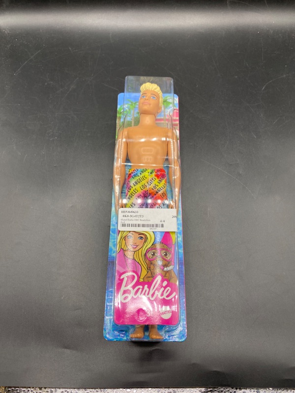 Photo 2 of Barbie Ken Beach Doll with Blonde Hair Dressed in Colorful Los Angeles-Print Swim Trunks
