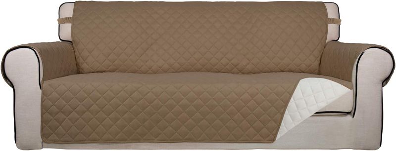 Photo 1 of PureFit Reversible Quilted Sofa Cover, Water Resistant Slipcover Furniture Protector, Washable Couch Cover with Non Slip and Elastic Straps for Kids, Dogs, Pets (Sofa, Camel/Ivory)
