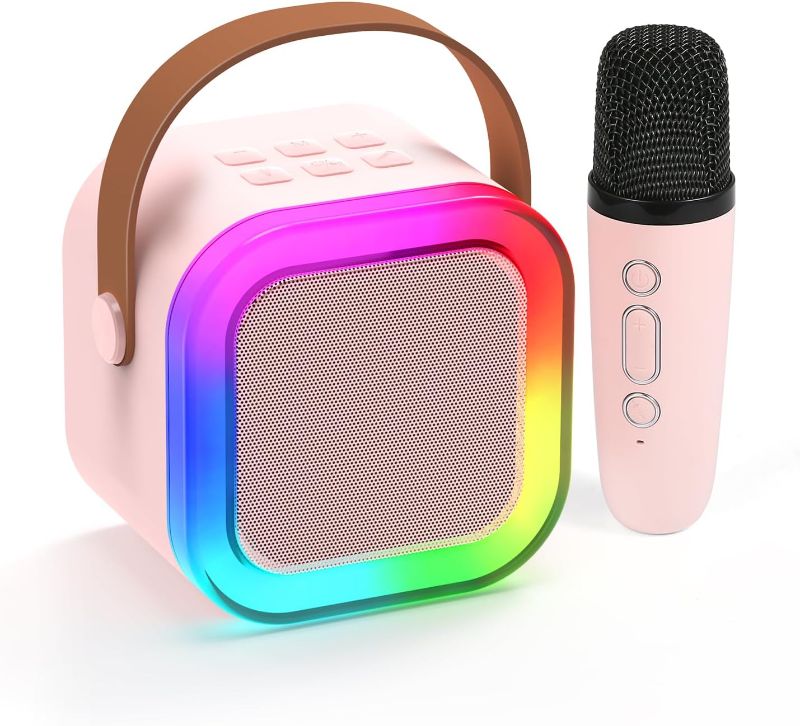 Photo 1 of Karaoke Machine for Kids Adults, Mini Karaoke Machine with Wireless Microphone, Portable Bluetooth Speaker with Voice Changing Effects & LED Lights, Best Gifts Toys for Girls and Boys Pink
