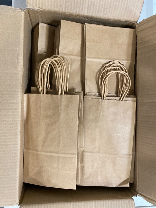 Photo 2 of AlexHome 100 Pcs Brown Paper Bags with Handles,8x10x4 inch,Size Small-Medium,Paper Gift Bags,Kraft Paper Bags Bulk for Grocery/Business
