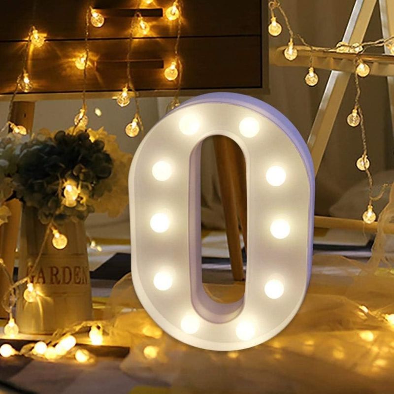 Photo 1 of LED Marquee Letter Lights Sign O 26 Alphabet Light Up Letters Sign P for Night Light Wedding Birthday Party Battery Powered Christmas Lamp Home Bar Decoration (O)
