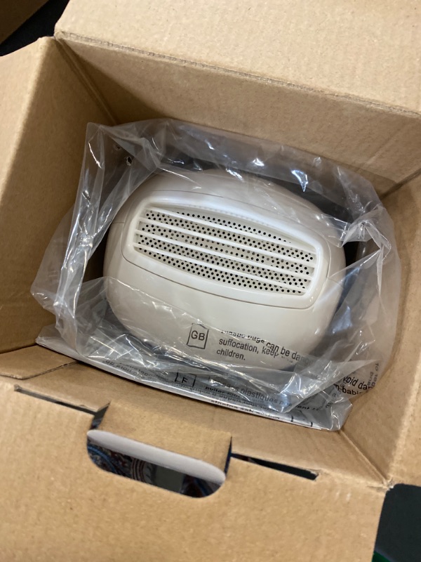 Photo 1 of Electric Mini Dehumidifier, Ultra-Quiet Auto Defrost Dehumidifier with Timer, 2200ML Water Tank and Drain Hose for Basement or Smaller Room
