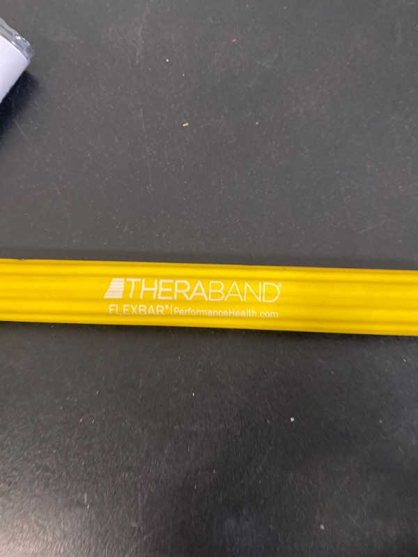 Photo 2 of THERABAND FlexBar, Tennis Elbow Therapy Bar, Relieve Tendonitis Pain & Improve Grip Strength, Resistance Bar for Golfers Elbow & Tendinitis, Yellow, Extra Light, Beginner
