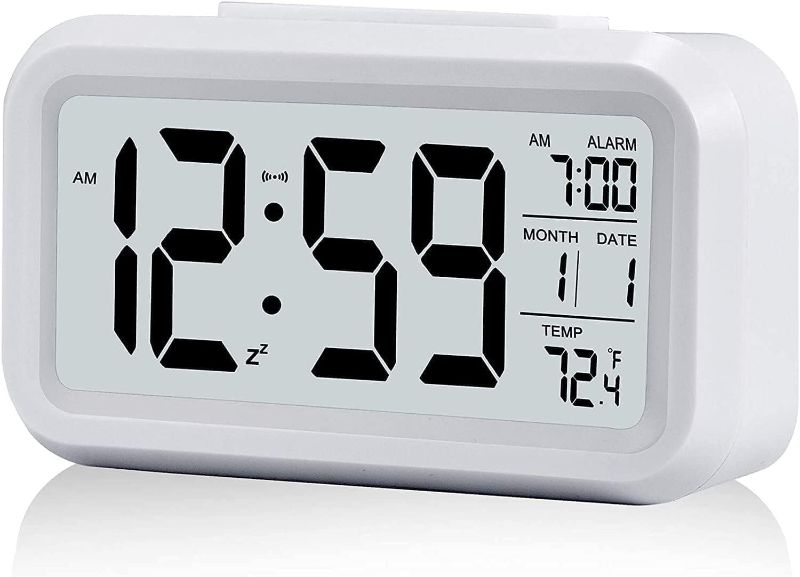 Photo 1 of Upgraded Digital Alarm Clock, 4.3" LED Display with Temperature Larger Lound Light Control Portable Snooze Calendar Brightness with Battery Powered Alarm Clocks Bedside for Everyone (White)
