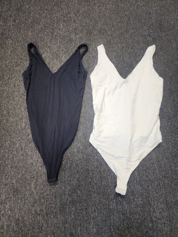 Photo 1 of XS 2 Piece White & Black Woman's Body Suits 