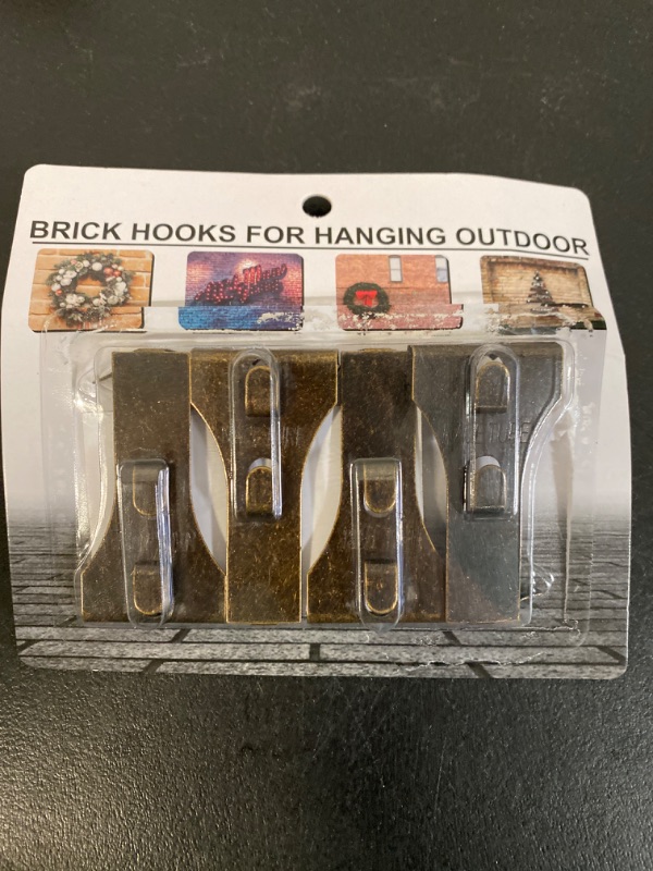 Photo 3 of Holiday Joy Brick Clips for Hanging Outdoors Indoors - Pack of 4 Hooks to Hang Wall Decor, Planters, Pictures, Christmas Decorations, & Wreaths up to 25 Pounds - Hanger Fits 2-1/8 to 2-1/3 Inch Bricks
