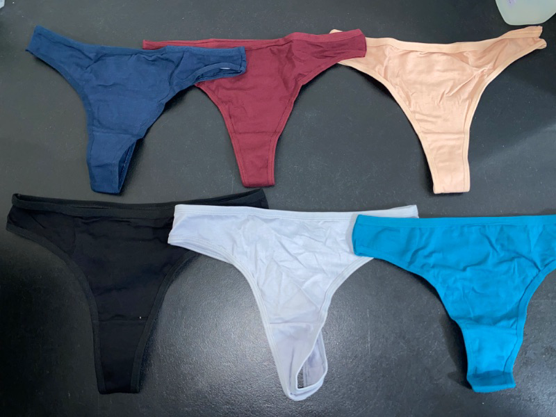 Photo 1 of 4 Pack Of M Women's Thongs 