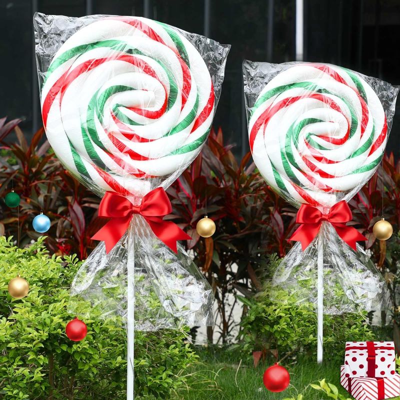 Photo 1 of Barydat 2 Set 5 Ft Christmas Giant Lollipop Pathway Lights Outdoor Decoration Christmas Glowing Lollipops Candy Stake Lights with 6 Modes for Yard Patio Lawn (Red White and Green)