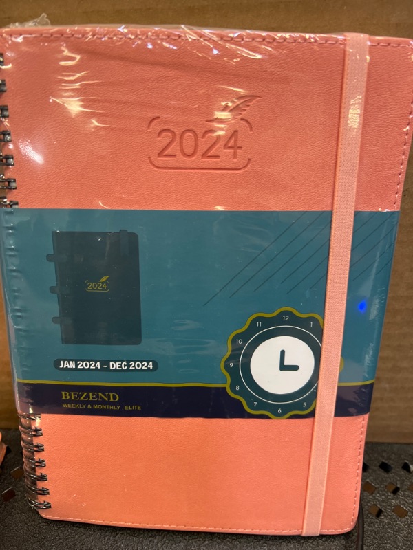 Photo 2 of 2024 Planner by BEZEND, A5 Calendar 5.8" x 8.5", Daily Weekly and Monthly Agenda,Spiral Bound,FSC Certified 100GSM Paper, Vegan Leather Soft Cover - Pink Pink 12 Months 5.8" x 8.5"