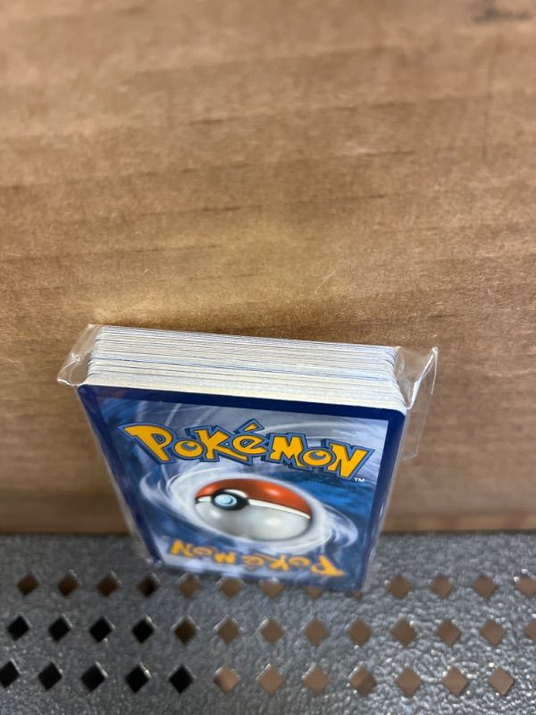 Photo 3 of 50+ Official Pokemon Cards Binder Collection Booster Box with 5 Foils in Any Combination and at Least 1 Rarity, GX, EX, FA, Tag Team, Or Secret Rare, with Cards Like Charizard and Detective Pikachu