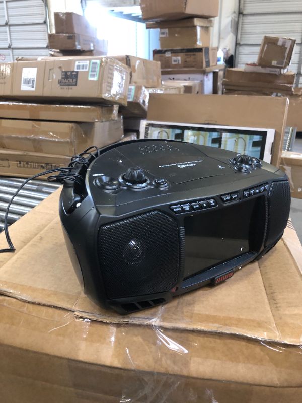 Photo 1 of Aiwa Portable Boombox, Crystal Clear Sound with 3W x 2 Speakers and Bass Function, Featuring a 7" LCD Display, Bluetooth Connectivity, FM Radio, CD/DVD Player, Streaming on Roku and Amazon Firestick Black