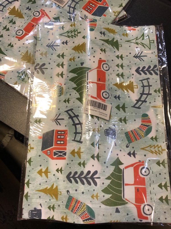 Photo 1 of Christmas Wrapping Paper for Kids Boys Girls Men Women, Gift Wrapping Paper Include Santa, Stockings,Tree, Xmas Wrapping paper 20 x 29 Inches per Sheet ?12 Sheets 48 sq. ft.?Recycled Easy Storage cartoon
