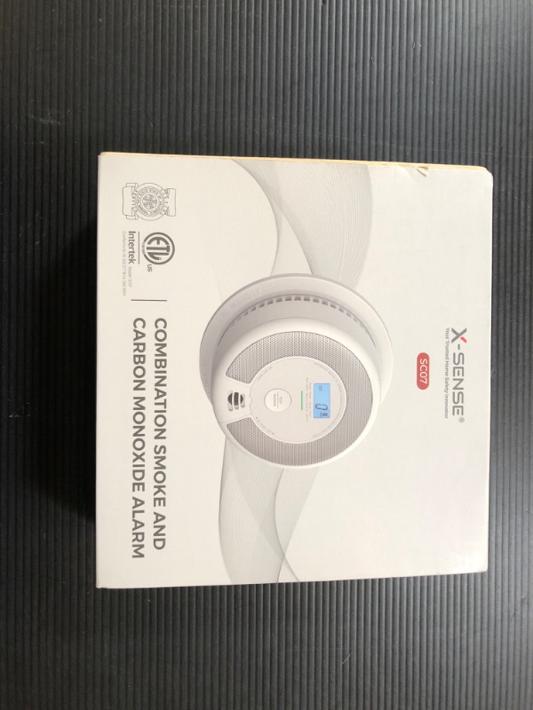 Photo 1 of X-Sense 10-Year Battery Combination Smoke Carbon Monoxide Alarm Detector with Large LCD Display (Standalone Model)