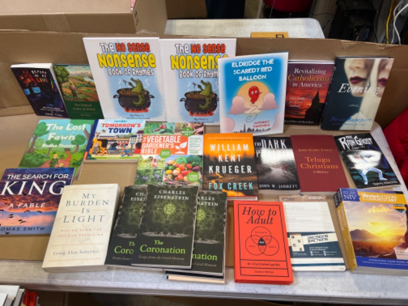 Photo 1 of box of books 