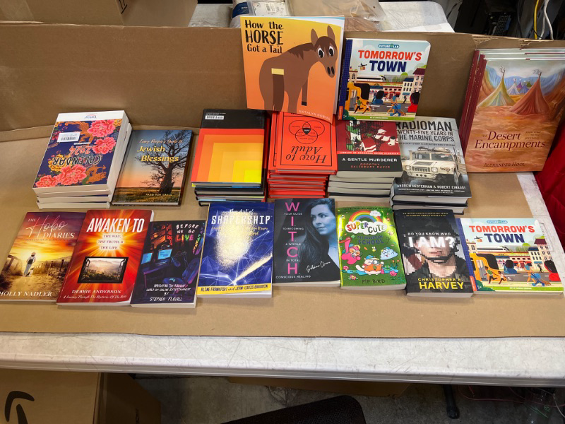 Photo 1 of box full of books 