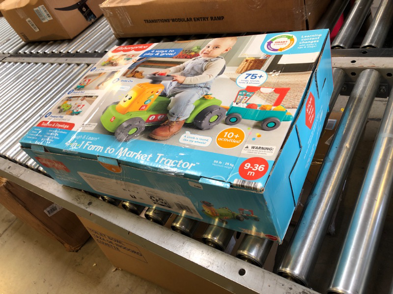 Photo 1 of Fisher-Price Baby to Toddler Toy Laugh & Learn 4-in-1 Farm to Market Tractor Ride On with Pull Wagon & Smart Stages for Infants Ages 9+ Months