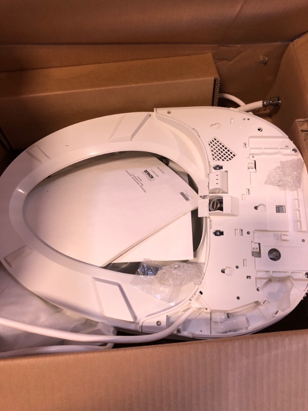 Photo 4 of KOHLER K-8298-CR-0 C3 455 Elongated Heated Bidet Toilet Seat, White with Remote Control, Quiet-Close Lid, Automatic Deodorization, Self-Cleaning Wand, Adjustable Water Pressure and Nightlight (USED)