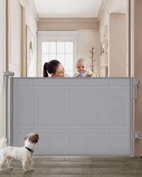 Photo 1 of Cumbor Retractable Baby Gates for Stairs, Extends up to 55" Wide Fabric Dog Gate for The House, 34" Tall Safety Child Gates for Doorways Hallways,Pet Door Indoor & Outdoor,2 Set of Accessories, Gray