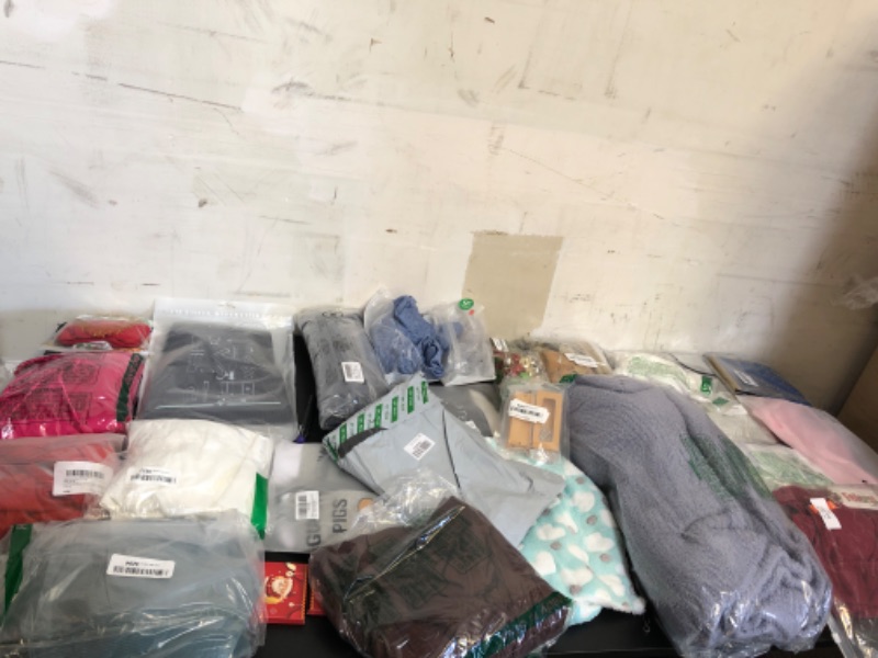 Photo 1 of mystery box lot filled with new and or used items mostly clothing items do vary on size and style + color sold as is no returns or exchanges 