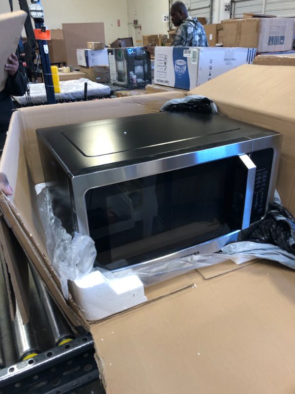 Photo 1 of TOSHIBA 4-in-1 ML-EC42P(SS) Countertop Microwave Oven, Smart Sensor, Convection, Air Fryer Combo, Mute Function, Position Memory Turntable with 13.6" Turntable, 1.5 Cu Ft, 1000W, Silver Air Fry-1.5 Cu.Ft.-Silver