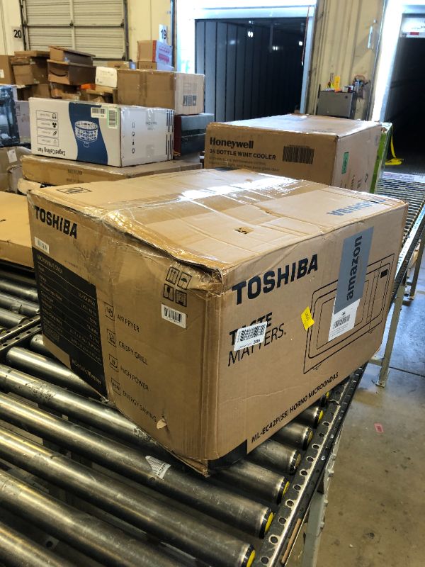 Photo 1 of TOSHIBA 4-in-1 ML-EC42P(SS) Countertop Microwave Oven, Smart Sensor, Convection, Air Fryer Combo, Mute Function, Position Memory Turntable with 13.6" Turntable, 1.5 Cu Ft, 1000W, Silver Air Fry-1.5 Cu.Ft.-Silver