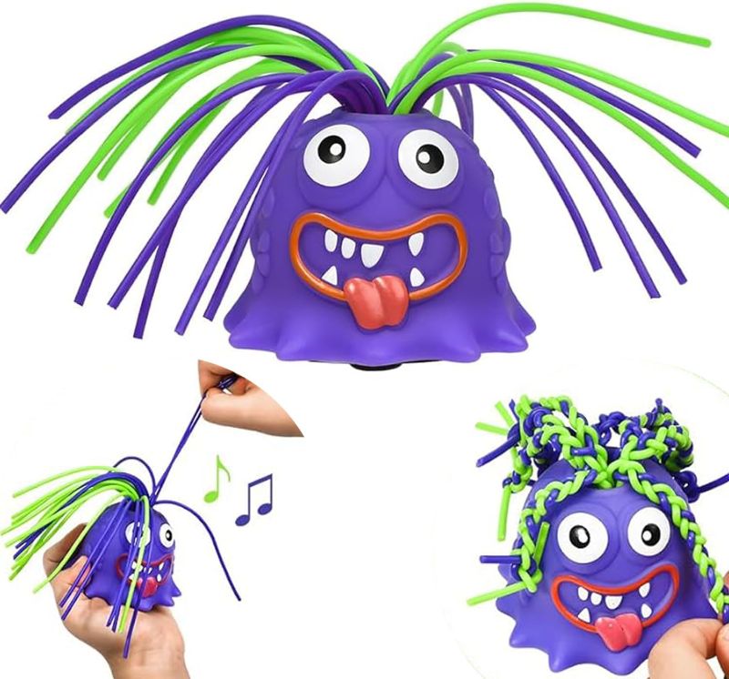 Photo 1 of Funny Hair-Pulling Screaming Toy, Each Scream is Different, Hair Pulling Fidget Toys, Screaming Monster Toys Anxiety Relief Toy, Gift for Easter,Christmas,Stocking Stuffer G (Purple)
