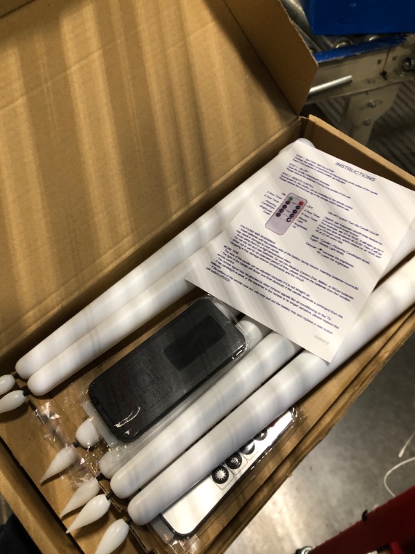 Photo 1 of Homemory 12 Pcs Flameless Taper Candles with Remote Timer Dimmer, 11 inches White LED Taper Candles, Plastic Battery Operated Candlesticks with Flickering Flame for Halloween Christmas Wedding Party White 12