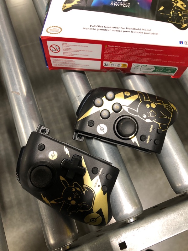 Photo 3 of Hori Nintendo Switch Split Pad Pro ( Black & Gold Pikachu) By - Officially Licensed By Nintendo and the Pokemon Company International
