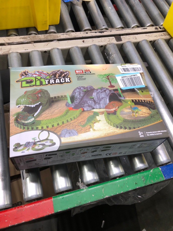 Photo 1 of Dinosaur Track Toy Set, 194pcs Flexible Track Toy Set with Dino Car, 360 Degree Rotation Car Track Toy, Create A Dinosaur World Road Race, Dinosaur Toys Track for Kids Ages 3 4 5 6 7 Year Old Boy Girl