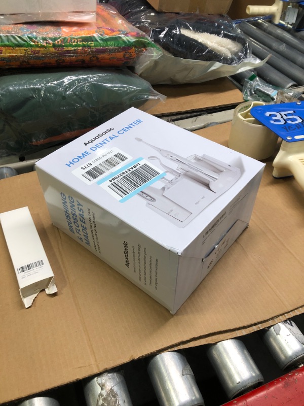 Photo 2 of ** new open box**
Aquasonic Home Dental Center Ultra Sonic Rechargeable Electric Toothbrush & Smart Water Flosser - Complete Family Oral Care System - 10 Attachments