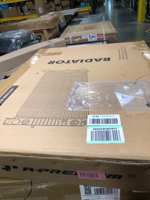 Photo 1 of Radiator for RAD2170 New Replacement Radiator Fits 2000-2005 Ford Excursion 
***Picture taken is what is looks like brand new in package***