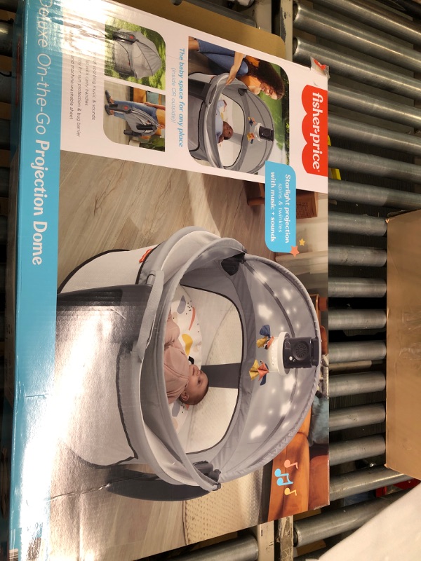 Photo 2 of Fisher-Price Portable Baby Bassinet And Play Space Deluxe On-The-Go Projection Dome With Lights Music And Canopy, Paper Shapes Gray