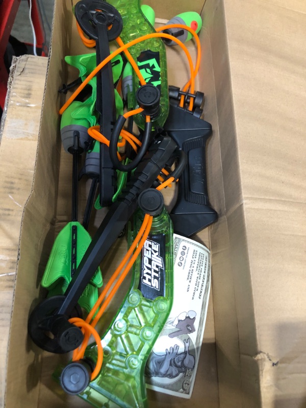 Photo 2 of Zing HyperStrike Bow Archer Pack, 1 Clear Green Bow, 6 Green Zonic Whistle Arrows and 1 Set of Orange Bungee, Shoots Arrows Up to 250 Feet