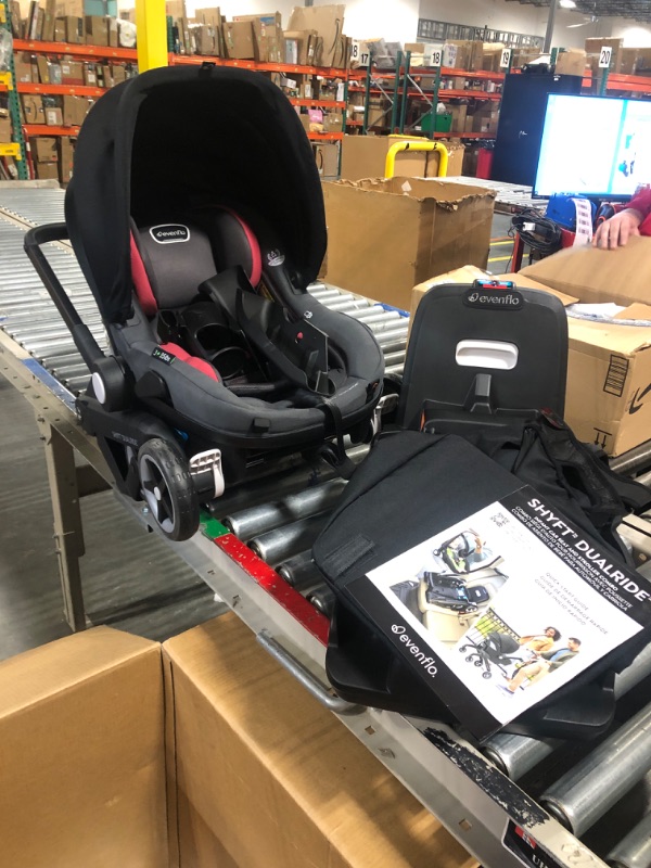 Photo 3 of Evenflo Shyft DualRide Infant Car Seat and Stroller Combo with Carryall Storage (Sylva Pink) Shyft Dualride Sylva Pink
***Used, but in good condition*** 