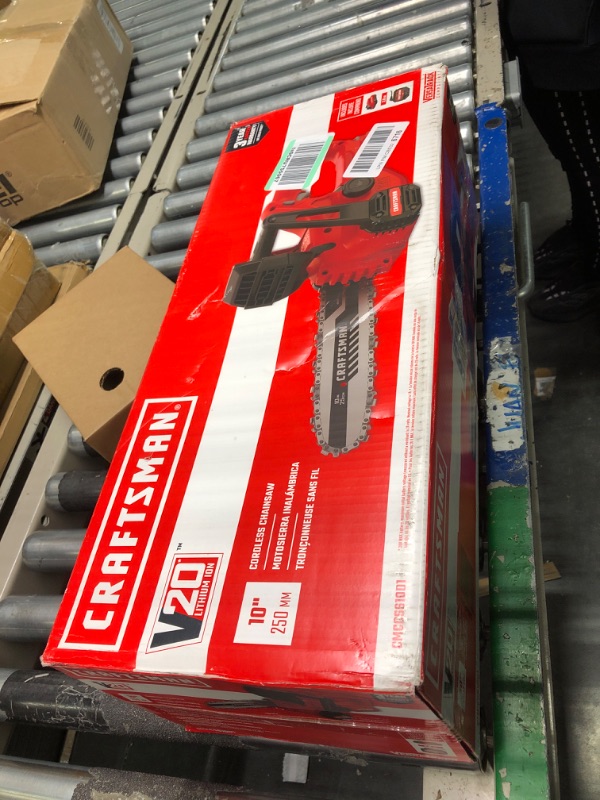 Photo 3 of CRAFTSMAN V20 Mini Chainsaw, 10 inch, Battery and Charger Included (CMCCS610D1) & Premium Bar and Chain Oil, Tools and Chainsaw Oil Treatment Reduces Bar and Chain Wear, 32 Oz, STP w/ Cordless Starter Kit Chainsaw + auto oil, G418591