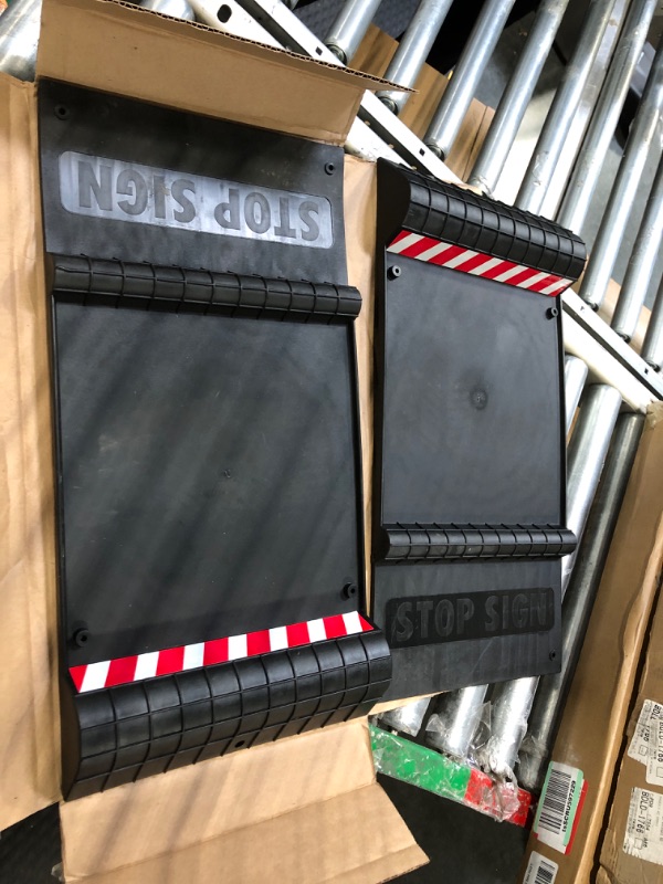 Photo 1 of ***very used*** Maxsa 37358-2Pack Park Right Perfect Parking Self Adhesive Anti-Skid Parking Mat for Cars and Trucks, 21" x 11" x 2", Black with Reflective Strip 2-pack Black Frustration-Free Packaging